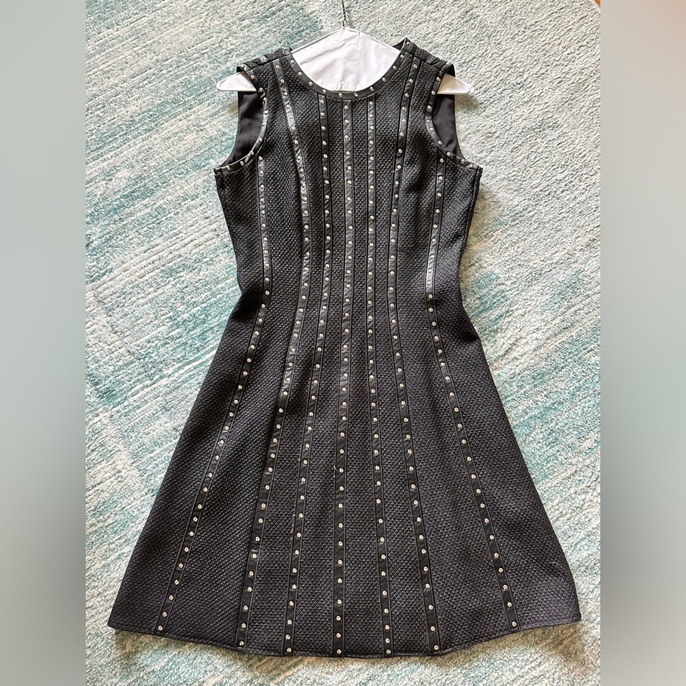 Antonio Melani black dress with leather contrast and stud embellishments.